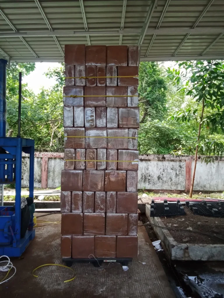 Pallet of compressed cocopeat blocks wrapped and strapped for export